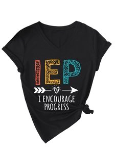 Detail of black V-neck T-shirt with IEP print and stylish front knot at the hem