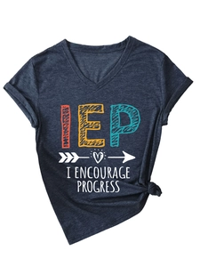 Detail of V-neck dark heather grey T-shirt featuring side knot and IEP graphic print