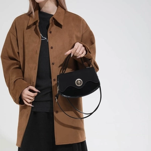 Retro black leather shoulder bag with gold clasp and matte finish for women