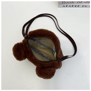 Detailed top view of brown plush bear tote bag showing zipper opening and interior