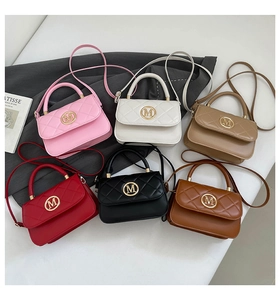 Detail view of stylish quilted crossbody bags in six vibrant colors with gold M logo