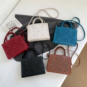 Embroidered top handle handbags in five colors with grid patterns and gold metal feet