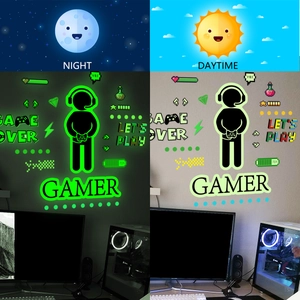 Detailed day and night contrast showing green glowing luminous gamer game room wall stickers