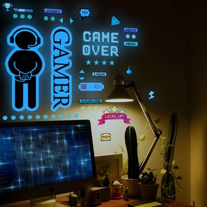 Luminous pixel gaming wall stickers featuring Gamer and Level Up text in a dark room