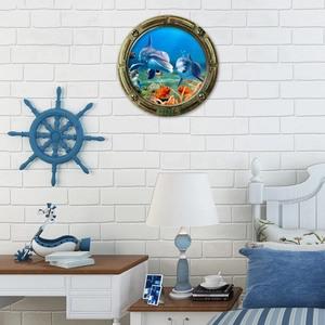 3D ocean porthole wall sticker showing dolphins and coral in a Mediterranean bedroom