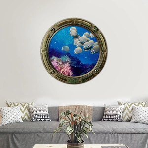 3D submarine porthole wall sticker featuring ocean fish and coral over a modern sofa
