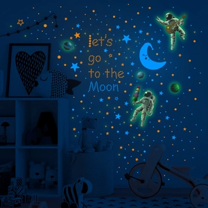 Glow-in-the-dark astronaut and moon wall stickers with let's go to the Moon text for kids