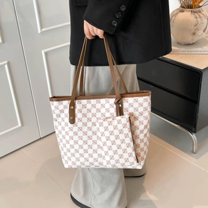 Red checkered tote bag with brown leather handles and matching small zip pouch for women