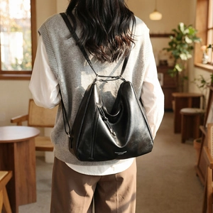 Classic black leather backpack for women with large capacity and versatile shoulder straps