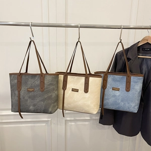 Classic large tote bag in grey white and blue marble pattern with brown leather handles