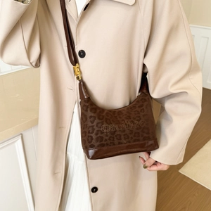 Stylish leopard print crossbody bag for women with brown leather straps and gold hardware