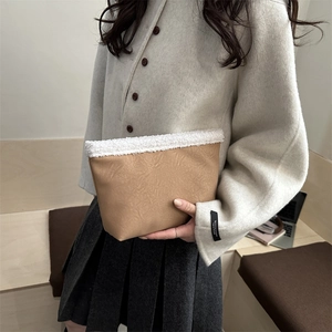 Winter minimalist camel leather clutch with white faux fur trim and pleated texture