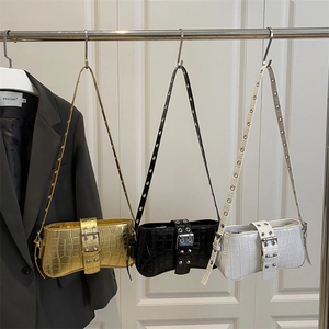 Minimalist crocodile pattern shoulder bags in gold, black, and white with metal buckles