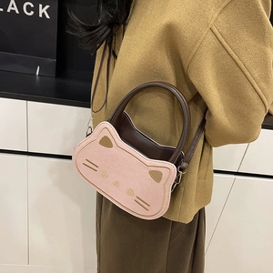 Cute pink cat-shaped crossbody handbag for women with dual top handles and strap