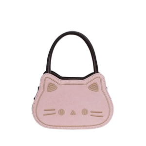 Pink cat-shaped faux suede handbag with embroidery details and dark brown handles