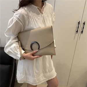 Chic beige envelope clutch bag with metal C-ring buckle and wrist strap for women