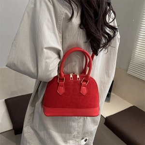 Stylish red leopard print shell handbag with gold hardware for women's winter fashion