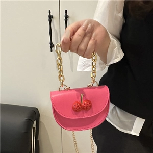Chic rose pink semi-circular mini handbag with cherry rhinestone detail and gold chain