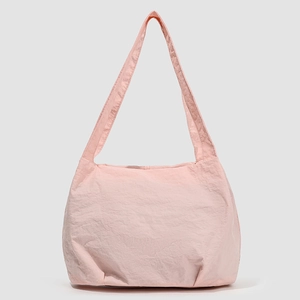 Minimalist light pink nylon bucket shoulder bag with pleated texture for women
