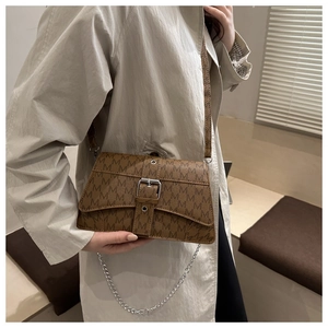 Classic brown crossbody bag with silver chain strap and all-over vintage pattern