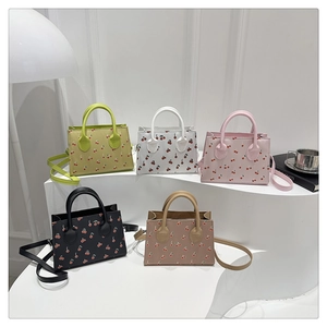 Detailed collection of mini tote bags in five colors with cute red cherry patterns