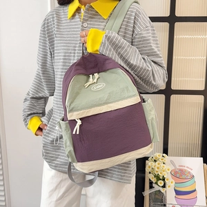 Minimalist color-block backpack in purple and green with drawstrings for students