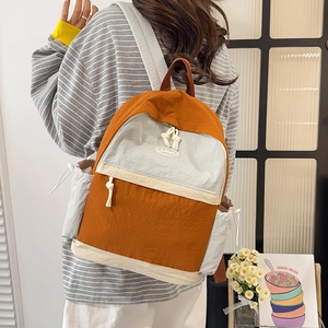 Minimalist orange and grey contrast backpack with drawstring pockets and rope pulls