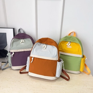 Minimalist lightweight nylon backpacks in multi-color contrast combinations with Lolol logo