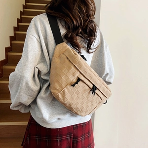 Chic beige checkered woven crossbody bag with adjustable black strap for women