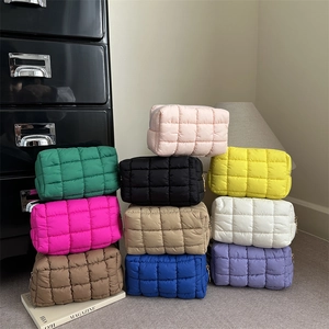 Quilted nylon clutch bag set with zipper in multiple vibrant colors and puffer design