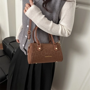 Brown leopard print barrel bag with golden hardware and fashion logo for women