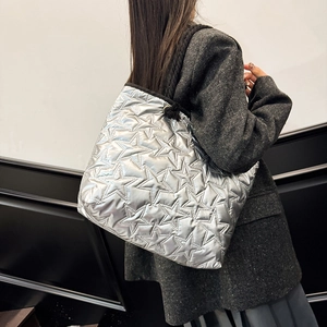 Silver quilted star pattern tote bag worn by model, large capacity chic shoulder bag