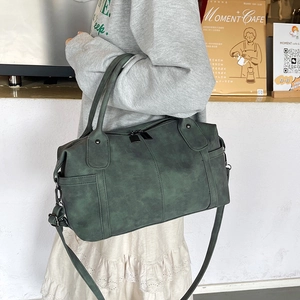Vintage matte dark green Boston bag with double top handles and detachable shoulder strap
