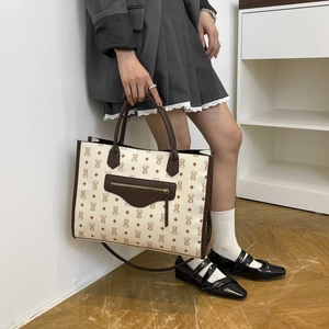 Chic cream tote bag with cute brown bear prints and large capacity for women