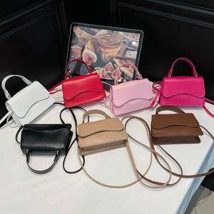 Minimalist mini square crossbody flap bags with top handles in seven diverse colors
