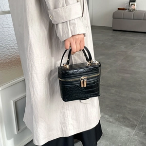 Fashionable black crocodile embossed box bag with gold double zippers and top handle