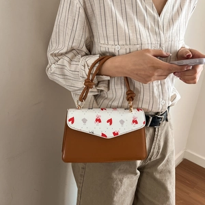 Fashionable cherry-print brown and white crossbody bag with cute heart and bear patterns