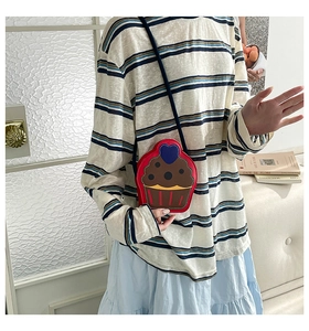 Detail of creative cupcake-shaped mini shoulder bag in multi-color PU leather