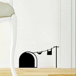 Creative mouse hole wall sticker featuring a silhouette of a laundry line and clothes on white wall