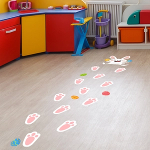 Pink bunny paws and Easter egg floor stickers for colorful kids' room decoration