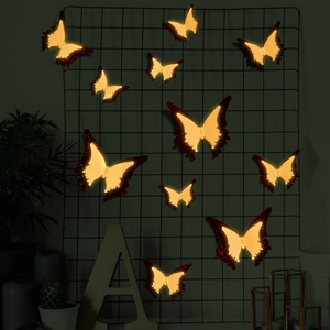 Set of 11 luminous 3D butterfly wall decorations with warm LED lights for home interior