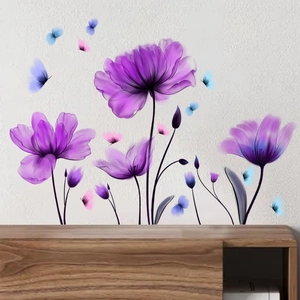 Purple tulip wall decal with blue butterflies on a white wall above a wooden cabinet