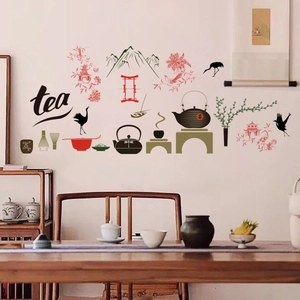 Detail of Chinese tea culture wall stickers with teapot and zen elements in a tea room