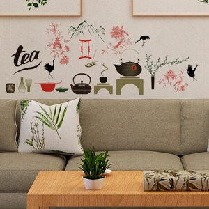 Detail of Chinese tea culture wall stickers with teapot, crane, and bamboo on a white wall
