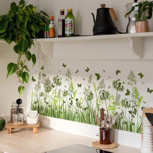 Detail view of waterproof PVC backsplash sticker with green plants and dandelion patterns