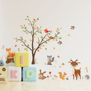 Detail of forest animal wall stickers with tree, deer, and fox for nursery room decoration