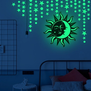 Luminous wall stickers featuring celestial sun moon and stars for bedroom decor