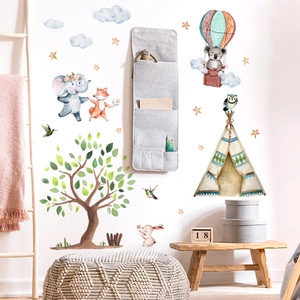 Detail view of watercolor animal wall stickers with elephants and koalas in a nursery