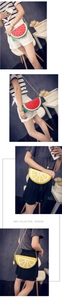 Vertical view of crossbody bags in watermelon and lemon shapes with gold chains
