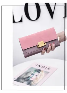 Pink frosted suede and purple leather wallet detail with rectangular gold metal buckle